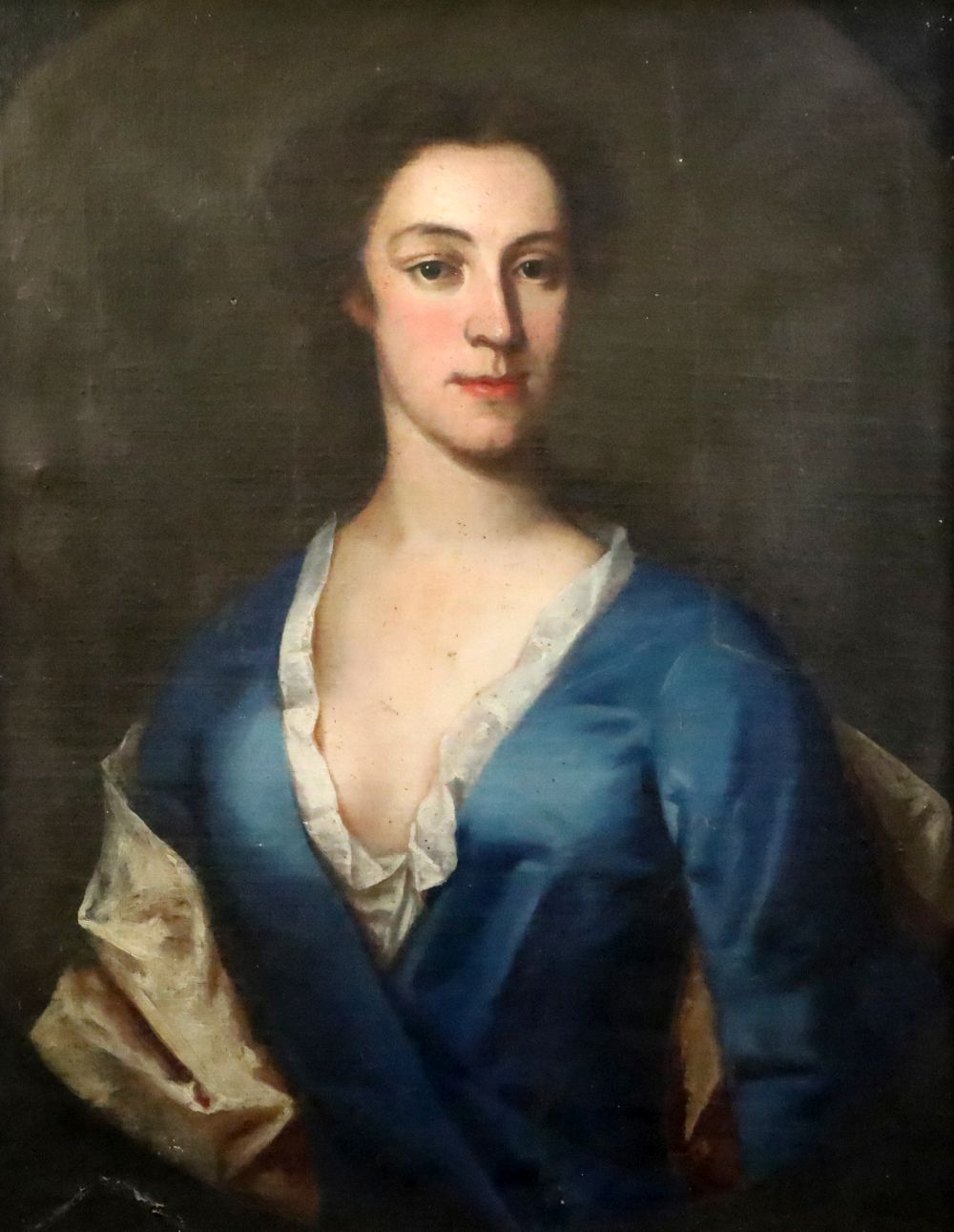 18th century English School Portrait of a lady wearing a blue dress painted to the oval, 28.5 x 23cm